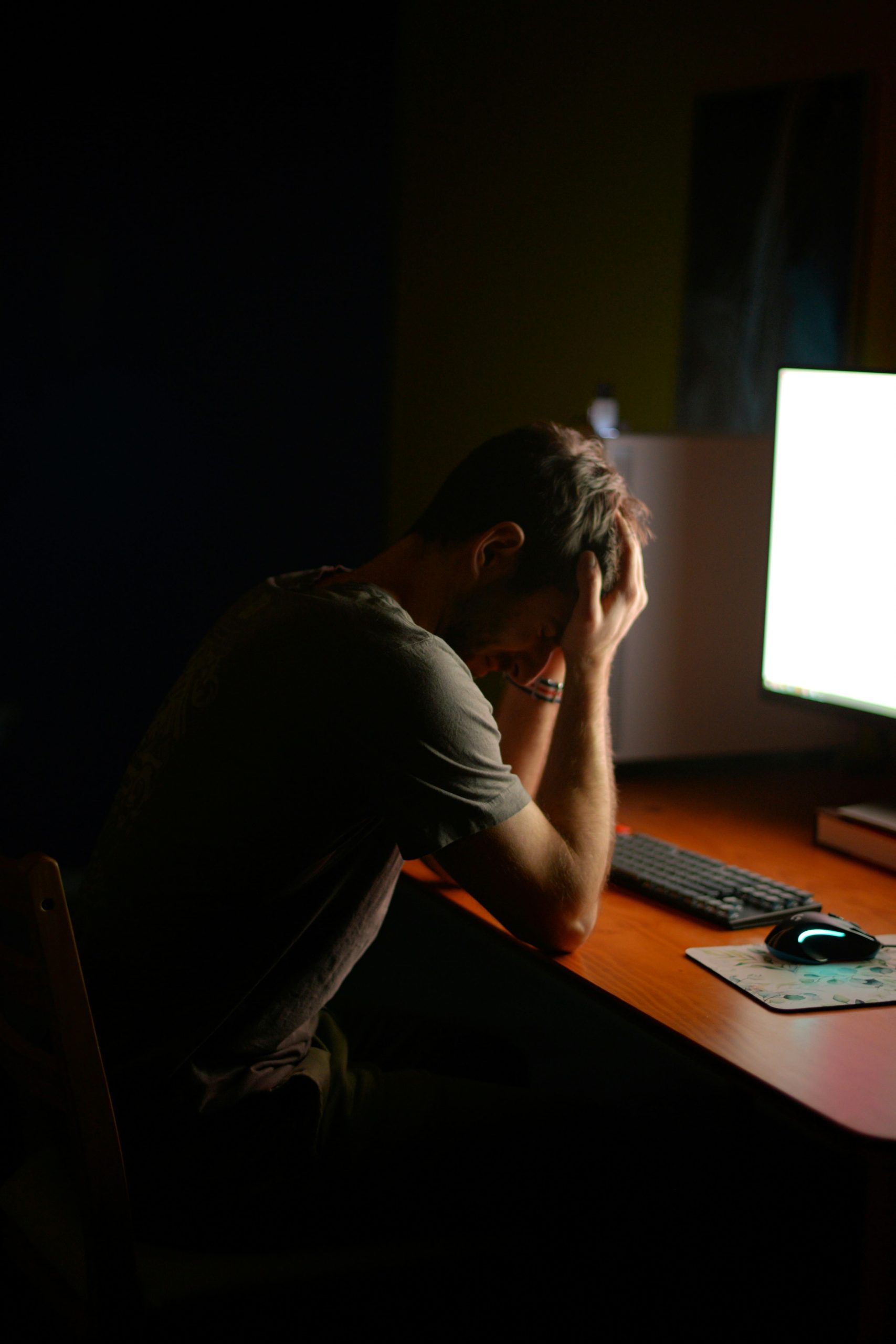 burnout, man with burnout, tired in front of computer, chronic workplace stress
